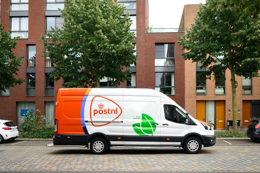 Electric PostNL delivery van in a residential street